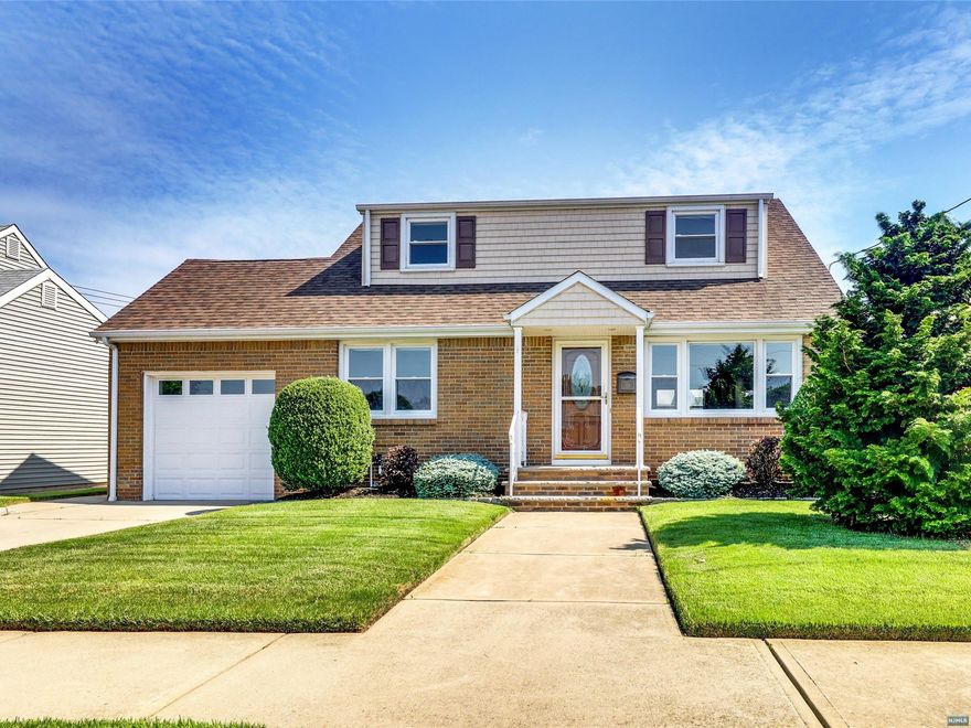 Nothing to do, but move-in! One of North Arlington's favorite streets. Original family owned. This house has everything you could possibly want. Beautiful hardwood and tiling floors throughout. Updated kitchen and two modern baths. Granite counter and SS appliances in kitchen. Can be easily converted back to a 3 to 4 bedroom house. Highlights include: central air, alarm, wired for internet, 200 amp electric, reverse osmosis whole house water purification system, absolutely gorgeous finished basement with family room and one of the nicest and largest laundry rooms you've ever seen! More features include: recessed LED lighting, 4 zone lawn sprinklers, paver and concrete patio, one car attached garage w/opener & driveway, beautiful and spacious built custom storage shed, entire yard features vinyl privacy fence, and is professionally manicured. Plenty of storage, newer HVAC, siding, windows and roof complete this gem of a home!