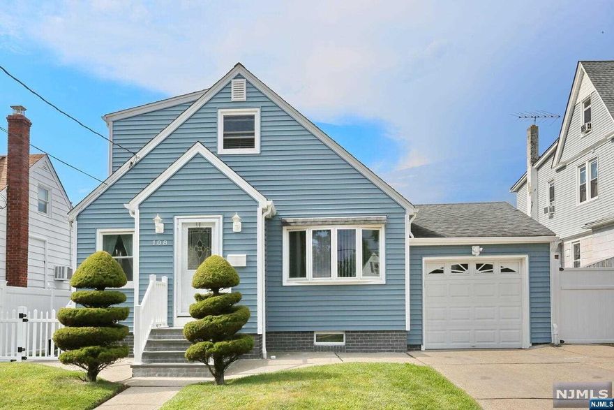 Make this lovely move in ready Cape Cod your new home! It features four bedrooms and two full bathrooms, as well as an attached one car garage and large driveway. This house has a newer roof, new siding, a brand new deck and a great yard, perfect for outdoor gatherings. The walk out basement has a kitchen, full bath and a rec room, great for extended family. You will find a living room, dining room, kitchen, full bath, and two bedrooms on the first floor. There are two bedrooms and a bonus room on the second floor that can be used as a home office or finished for a third bathroom. Conveniently located within walking distance of train station and bus stop, with too many improvements to list.