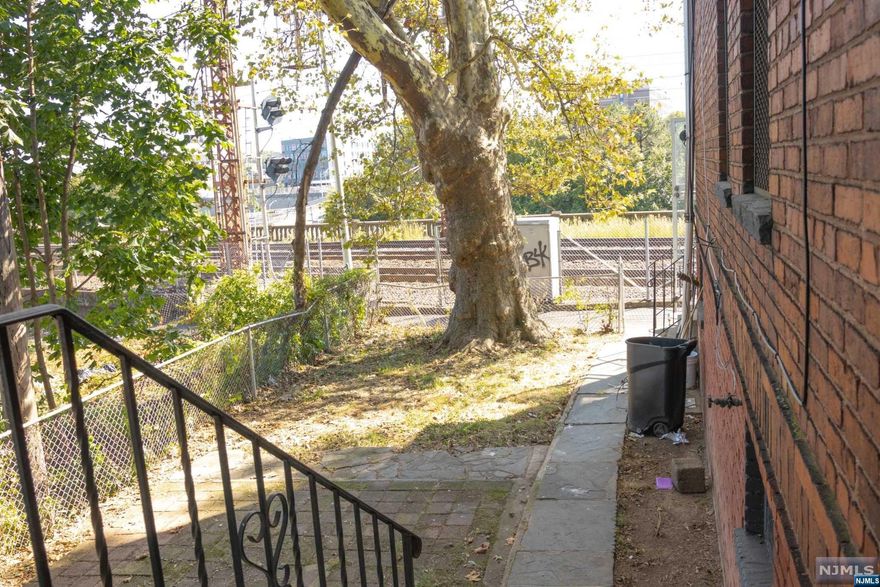 Welcome to this beautiful half duplex on a quiet residential street in East Orange! Located on an end street next to a train line. Very close to public transport, shopping, and houses of worship. Can be an investment opportunity, or a first-time homebuyer starter home! The home is currently vacant and easy to show.