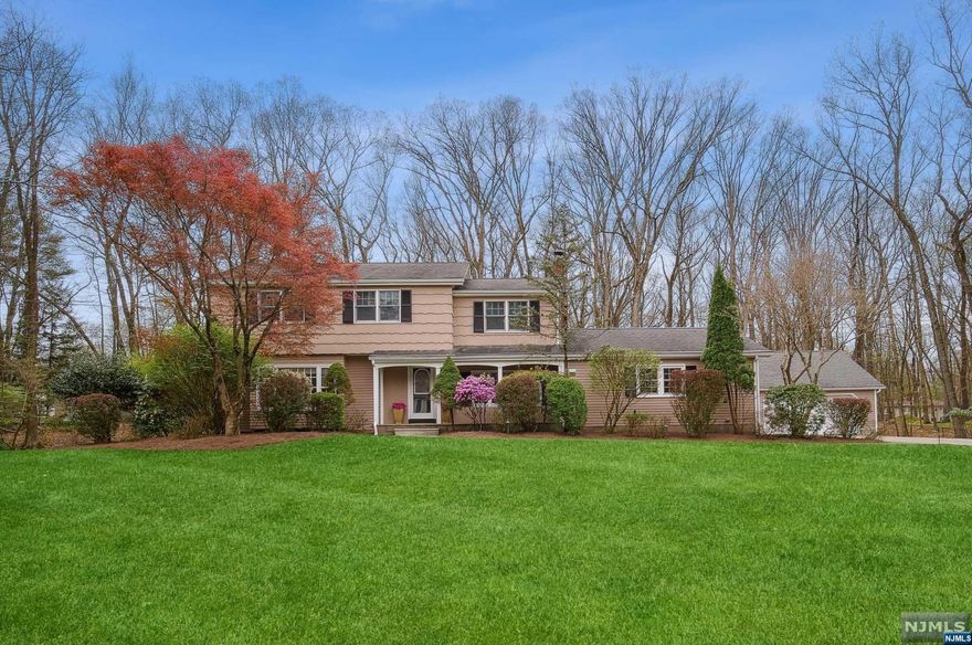 Welcome to this 5BR, 2.5BA CH Colonial in one of Ramsey's most sought-after neighborhoods! Situated on .92-acre, it offers both space and tranquility. As you step inside, the foyer warmly greets you, leading to a formal LR, FDR and a sunken FR w/fpl. The 1st floor also features a BR, pretty powder room and a sunny reading nook. Culinary enthusiasts will adore the spacious kitchen, boasting custom cabinetry, a center island, and a breakfast area with French doors that open to the large deck. The expansive backyard, complete with a fire pit, is an entertainer's paradise. Picture badminton games and s'mores this summer! The primary suite with FB/SS and walk-in closet, alongside 3 additional BRs and a FB can be found upstairs. A finished basement provides ample storage and direct backyard access. Car and hobby lovers will appreciate the 2-car attached and 2-car detached garages! Plus IG sprinklers, invisible fence for dogs, and more! Call Listing Agent Kristin Graves 201-825-6600x222.