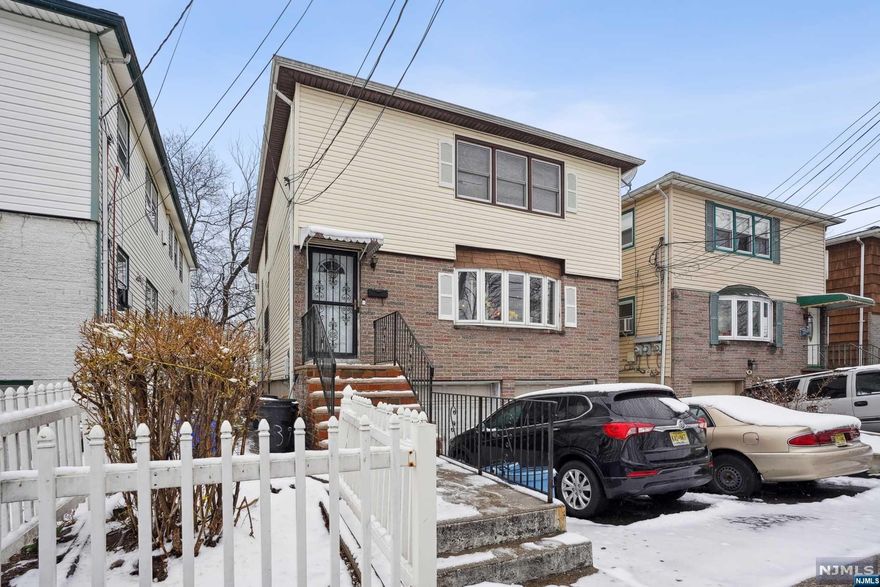 Welcome to this wonderful 2 Family investment opportunity! Both units offer 3 Bed, 1.5 Bath. Fully finished basement includes washer/dryer, half bath, sink and extra storage space. Parking is no issue with an attached 2 car garage and 2 additional parking spaces along with street parking. Easy access to major highways, public transit and parks. Minutes away from Newark Liberty International Airport. Perfect for an owner occupant or investor! 2nd Floor is owner occupied.