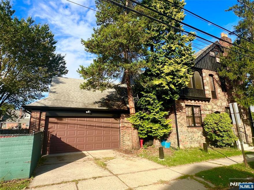 Large Charming Russian Historic Home on the border of Fort Lee, Cliffside Park, and Edgewater. Inviting foyer with stained glass and sunken living room. This large 4 bedroom plus den, 4.5 bath house is located 1 block to NYC transportation and minutes from George Washington Bridge. Perfect for NYC Commuters or an expanding family. The home features vintage stone exterior with a solid front wood door. Newly finished hard wood floors throughout the home, original tile and a large kitchen with separate dining room. This unique home features include outdoor terrace and sunroom, full finished basement with bar, Russian sauna, bathrooms with large soaking tubs, cedar closets, plenty of storage space, backyard, Washer/Dryer and more. Also included is a large spacious 2 car garage with additional workshop space.