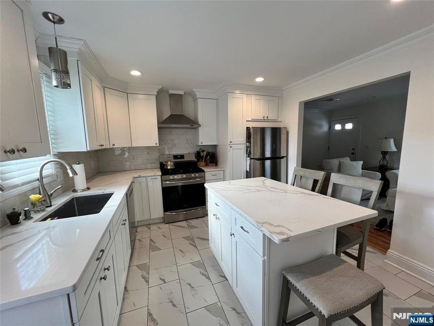 Come check out this beautiful renovated 2 bedroom apartment in Bergenfield. This apartment has everything you are looking forL, laundry in unit, garage parking, and storage. There is also extra space in the basement that can be used for an office, gym, or even a playroom.