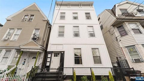 Photo of 129 Park Avenue, Paterson, NJ 07501 (MLS # 25034163)