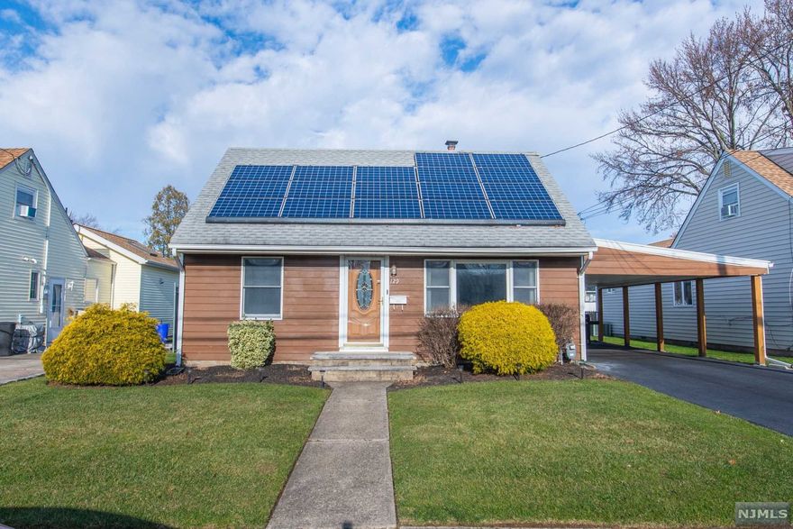 Lovely Cape Cod in Fantastic Neighborhood! Nicely Updated Kitchen Ready to Serve! Two Bedrooms up & Two Bedrooms Down. Nice Fenced-in Level Rear Yard w/ Patio - Great for entertaining! Large Driveway w/Carport! Perfect Starter or Downsize Home! Solar panels are leased, 20 year lease originated in 2016