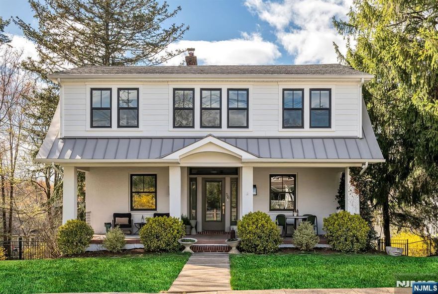 The inviting front porch offers a warm welcome to this remarkable residence nestled in the heart of desirable Ridgewood, NJ. This stunning house has been meticulously renovated, 2021, to combine modern luxury w classic charm. The home boasts a thoughtfully designed 3-floor extension highlighting the quality craftsmanship & attention to detail. Spacious & versatile interiors, open-concept eat-in kitchen w Marble Island flows into living space w wood-burning fireplace. Convenient 1st floor bdrm/family rm & full bath. Ideal 2nd flr layout, FOUR bedrooms, hall bthrm, laundry rm. Primary En-Suite w TWO custom walk-in closets, bath w soaking tub, WC & Restoration Hardware double vanity. Expansive .34/Acre fenced-in backyard w patio, walk-out basement & 3-car garage. Positioned in an ideal close-to-town location, combining the best of suburban tranquility w urban convenience, making it a perfect choice for those seeking a dynamic yet peaceful lifestyle. Where Luxury meets-LOCATION!