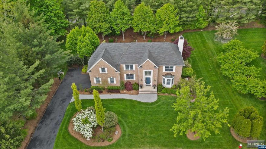Experience luxury in this 5 bed, 3.5 bath home on a beautifully landscaped +/- .5 acre lot. Enter through the light-filled 2-story EF ft double coat closets, leading to a formal DR & chef's dream EIK ft SS appliances, pantry closets & sunny breakfast area. The KIT flows seamlessly into the FR w/Cozy fplc, while the LR is perfect for relaxing. Convenience is key w/The 1st floor BR/office, full bath & mudroom. Upstairs, the primary BR suite fts vaulted ceilings, seating area, lrg WIC & spa-like primary bath. 3 ADDL BRs, full bath & laundry room complete the 2nd floor. The LL was built to perfection in 2012 offering ADDL living spaces w/A large rec room/2nd family room w/Speakers, bar w/Wine fridge, professionally designed home gym, half bath & media/bonus room. Outside, enjoy the meticulously landscaped yard w/Oversized deck. Other amenities incl water softening system, whole house generator & 2 car garage. HIGHEST AND BEST MUST BE SUBMITTED BY MAY 10TH @ 5PM.