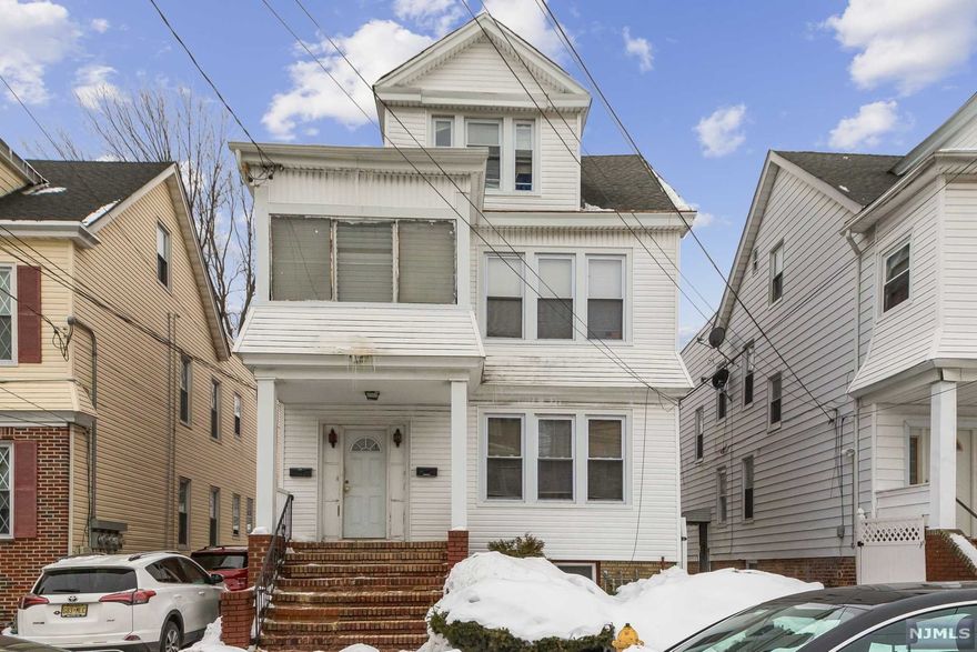 Incredible Investment Opportunity! This proven money maker includes two units, a detached garage, and so much more! The first unit opens to a huge living room and dining room with an eat-in kitchen. This unit include two large bedrooms and a bathroom! The second unit includes both the second and third floor of this home. The second floor mirrors the first unit, and the third floor includes another bedroom and an office/sunroom. Near public transportation, major highways, schools, shops, etc! Don't miss this one!