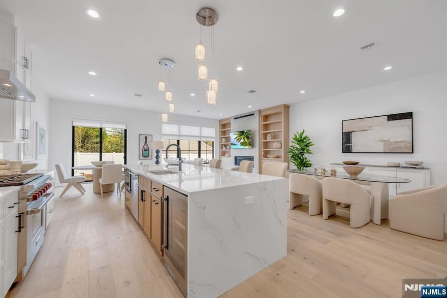 Introducing Victoria Estates in Paramus, a collection of 42 luxury townhomes. This brand new construction community is truly one of a kind, built by Rock Solid Builders, known for their impeccable portfolio. Experience a lifestyle of unparalleled sophistication where every detail reflects superior craftsmanship. Each residence offers over 5,000 sq ft of living space, featuring a two car garage and three levels of luxury living. The first floor showcases a gourmet kitchen with a 10 foot quartz waterfall island, Sub Zero and Wolf appliances, and custom cabinetry, flowing seamlessly into an open concept living area with a gas fireplace and custom built ins. Upstairs, the primary suite offers a spa inspired en suite bathroom and two oversized walk in closets with custom shelving, along with two additional spacious bedrooms, a full bathroom, and a large laundry room. The fully finished basement includes a recreation room, gym, and full bathroom. Ideally located just minutes from major highways, schools, and shopping. Experience the extraordinary. Model Home Unit 37 Feldman Ct.