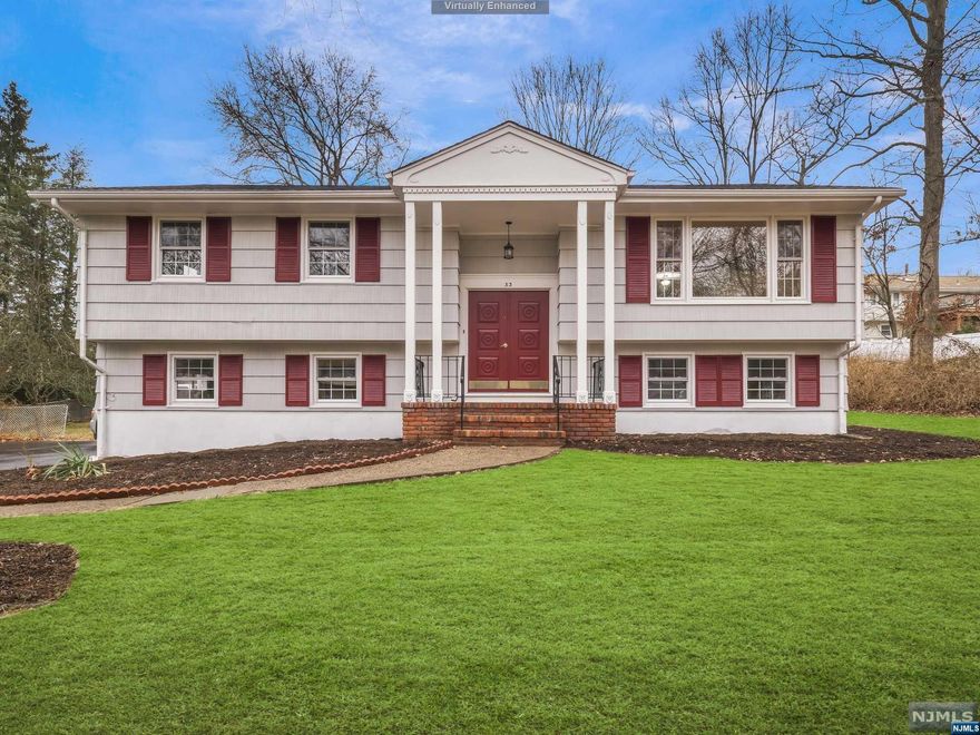 Nestled on a quiet street, this spacious and fully renovated Bi-Level home is move-in ready. Airy and bright, the large living room opens to the dining room both with newly refinished hardwood floors. Gorgeous eat-in kitchen with white cabinets, custom tile back splash, granite counters, stainless steel appliances and breakfast bar for additional casual seating. The primary bedroom offers plenty of closet space and private en-suite bathroom. Two additional bedrooms and stylish full bathroom with dual vanity complete the first level. Ground level offers cozy family room with door leading to rear yard, powder room, laundry room, garage access and bedroom that could easily be used as a home office depending on your needs. 2 car garage. Conveniently located near schools, shops, restaurants and major highways.