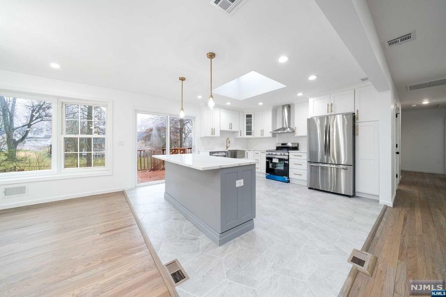 With a new year comes a new listing! This newly renovated single family home has everything you're looking for. The open floor concept on the first level is bright and impressive as you walk into the home. A skylight bathes the kitchen with natural light as well as LED lighting. The kitchen design is both airy and functional providing ample space and storage throughout. With 4 bedrooms and 3 full baths, both the household and guests will be comfortably accommodated and pleased by the finishes this home has to offer. The walkout basement to the large backyard is ready for your patio furniture for BBQs and entertaining. A two car garage, laundry room and new roof are just a few more perks this property has to offer. Located next to O'connor Park, route 10, and Interstate 280 adds to the list of amenities and ease of commute.