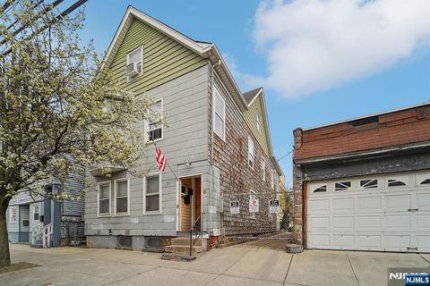 Photo of 6 4th Street, Passaic, NJ 07055 (MLS # 26013246)
