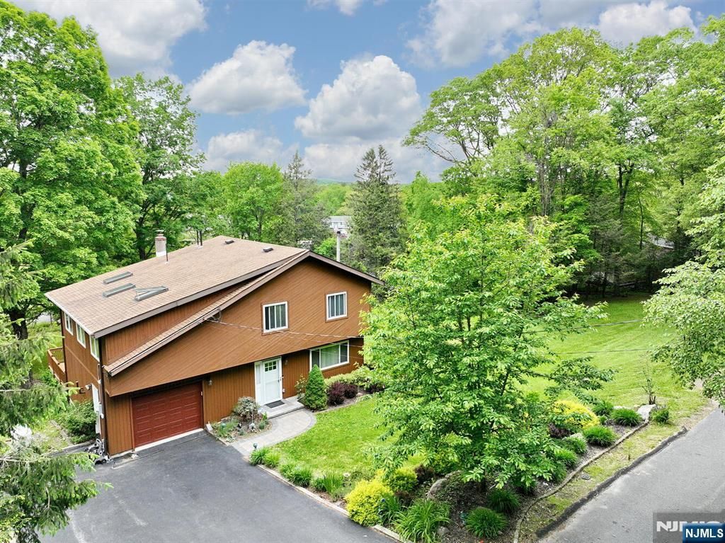 Photo of 64 Larchmont Drive, West Milford, NJ 07421 (MLS # 26011559)