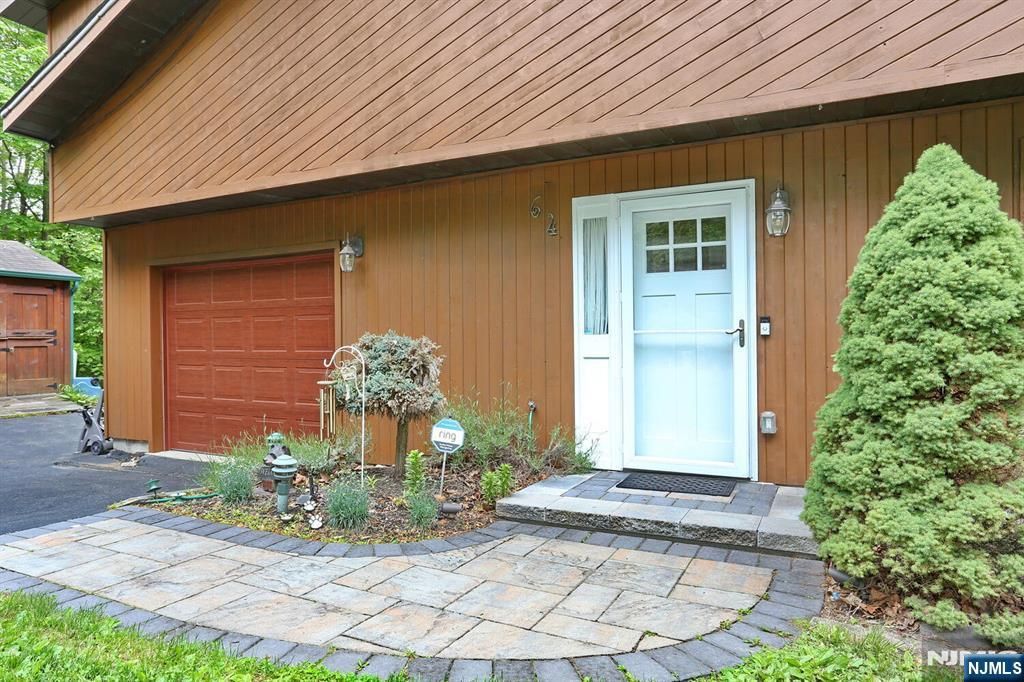 Photo of 64 Larchmont Drive, West Milford, NJ 07421 (MLS # 26011559)