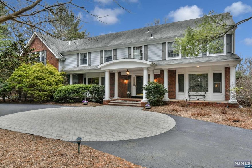 Enjoy a peaceful water view setting with low taxes at $13,200. New England style colonial has open concept main floor great for entertaining. Enjoy an expansive screened 3 season porch with gas BBQ that opens onto wide level lawn and pond for kayaking and fishing. This is a setting to enjoy in every season. A wide veranda and backyard patio invite you to be outdoors. Stay fit and relax in the indoor exercise pool while enjoying views of the backyard. Retire to the large primary suite with wide windows to soak up a view of the lawns and lake. A junior suite and 3 more bedrooms complete 2nd floor. Bright loft area is perfect for home office. Top rated schools. New central A/C installed in 2022 for primary bedroom. Newer furnace and tankless water heater installed. Close to major highways, diverse dining, shops, acres of parkland and more. Less than 25 miles to NY City. Owner holds valid NJ RE license