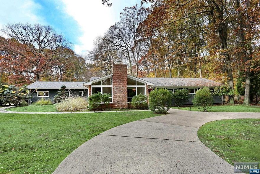 Custom Sprawling Ranch showcasing love of home and pride of ownership delivered to you with all of the quality and comforts of one floor living with extended family options. Your peaceful escape in the suburbs, sure to please the most discerning buyer in search of spectacular 1 acre property on a private parklike setting on the coveted West side of Montvale. Showcasing 2900+ sq.ft. plus expansive part finished lower lvl! Possibilities are endless at this one-of-a kind home! Vaulted ceilings, large sundrenched custom windows, open entertaining living spaces to incl. grand great rm, gracious living rm, entertaining dining rm, lge custom kitchen with SS applcs, granite cntrs, center isl. & sunfilled brkfst area w/sliders to spacious deck overlooking flat, deep, luscious rear yard. FAB primary suite w/lge sitting rm (or 5th bedroom) & full bath. 3 addt'l bedrms, one on it's own wing adjacent to newly renovated full bath. Close to TOP Rated schools, shopping, NYC Trans. A RARE Find!