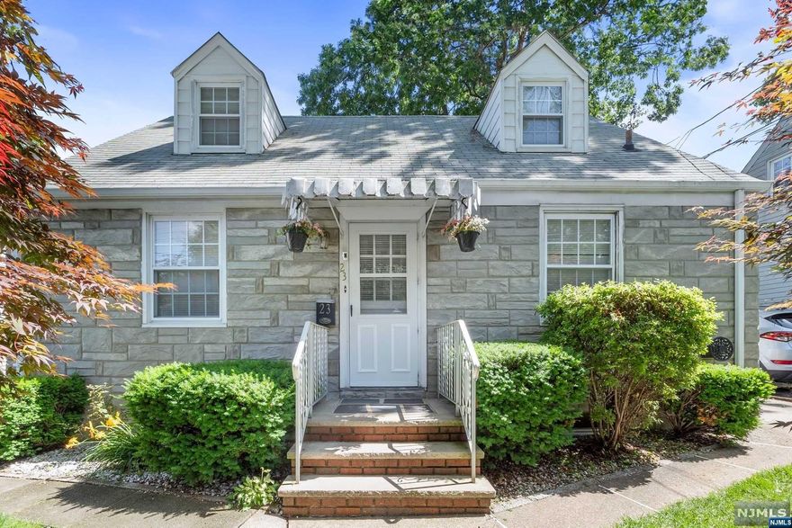 Dream location in Hasbrouck Heights, situated on a picturesque tree-lined block, with an easy commute to the city and 1 block to Woodland Park! This well-maintained property is the ideal place to call home. Featuring two generously sized bedrooms with the potential to effortlessly convert to three. Updated kitchen, recently refinished hardwood floors throughout the 1st floor, nice sized living room and a dining room that leads to a large patio/deck. The full unfinished basement presents a canvas of possibilities, allowing you to customize and expand according to your preferences. This blank slate awaits your creative touch. Don't miss out on the opportunity to call this charming residence your own!