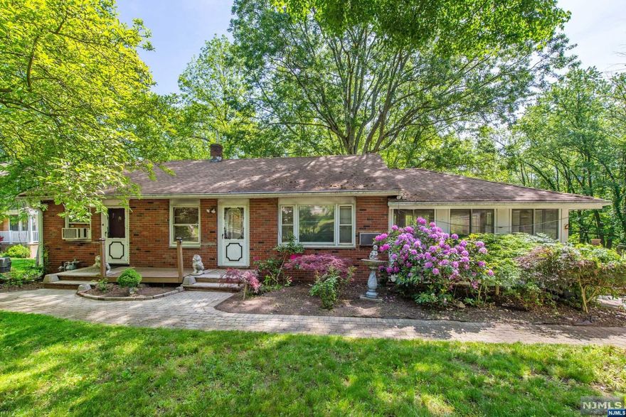 Single family raised ranch ideally located on this beautiful outdoor oasis. Natural gas, public water and sewer. LOTS of parking with two driveways for 10 parking spots! Storage abounds with full length basement, attic and large outside shed. Basement includes workshop, laundry, newer multi zone furnace and ground level walk out. Near public transportation, highways, groceries, shopping and under 1 hour from NYC!