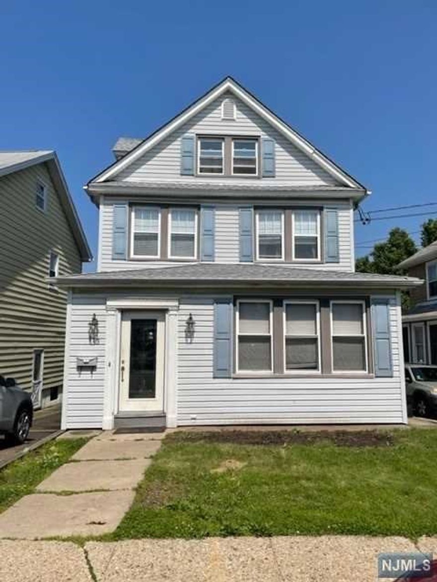 Bright and airy 3 bedroom, 2 bath side hall colonial. The main level features an entry foyer with large coat closet, spacious living room, dining room, modern eat-in kitchen with ss appliances, granite counters, breakfast bar and sliding glass doors that lead to a fabulous deck. The second-floor features 3 bedrooms and a recently renovated full bath. The 3rd floor walkup attic provides tons of storage and possibility of a 4th bedroom. The full finished basement features a family room with custom built in, full bath and laundry room. Other highlights include original chestnut moldings, hardwood & tile flooring, central air, gas bb heating and recessed lighting. Conveniently located to NYC transportation - close to schools.