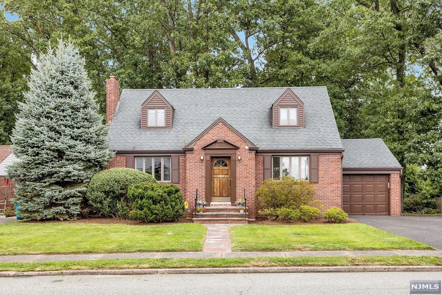 Solid brick home perched at top of Jerome Place. Enjoy colorful sunrises and sunsets. Extremely desirable neighborhood in sought after school district. The rooms flow effortlessly from the entry foyer into the spacious living room with custom stone fireplace. The living room opens into a FDR and a sunny eat in kitchen. Both rooms boast large picture windows that overlook a charming tiered slate patio and park like backyard with mature trees and shrubs. The 1st floor has master bdr, a 2nd bdr, full bath and cedar closets. 2nd floor has 2 large bdrs and full bath. Full finished bsmt. with family room, office, laundry, craft room and storage. Entry from bsmt into heated garage w/ee, and attic space. C/A and gas heat. Highly coveted for its proximity to houses of worship, parks, schools, shops public trans, and proximity to NYC. Make this the house of your dreams! Expansion is possible! Fun Fact..Yankee Player Gene Woodling was 1st owner of this fine home. House sold in as is cond.