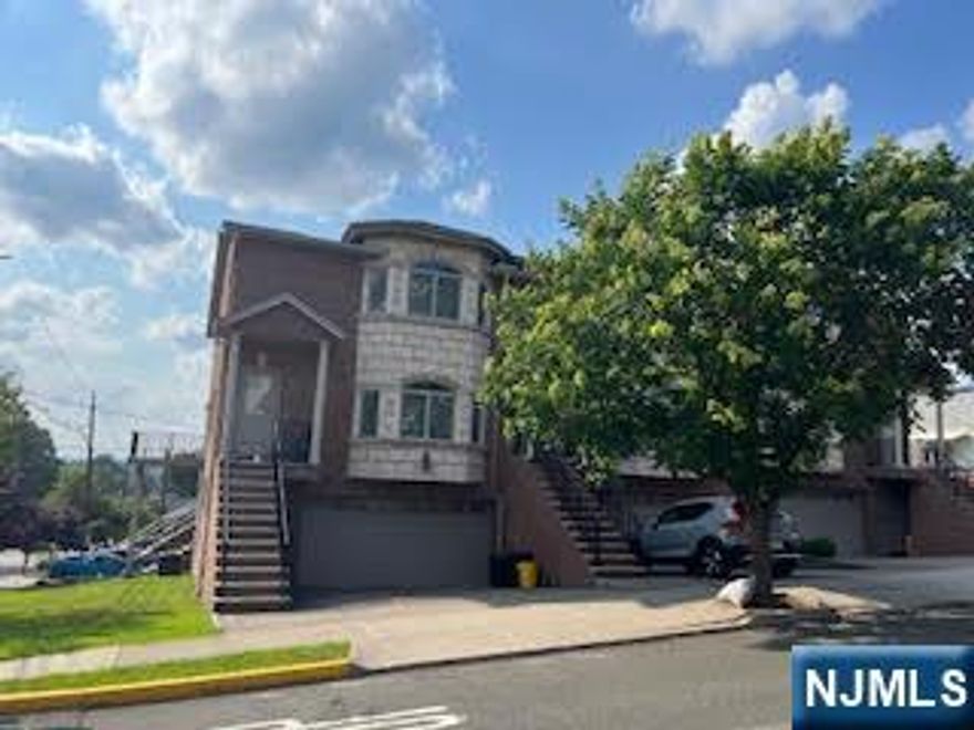 WHOLE HOUSE NEW PAINTING. CORNER UNIT. OVER SIZED TOWNHOUSE APPROXIMATELY 3000 SQUARE FEET. FEATURES AN AIRY FLOOR PLAN WITH 9 FT HIGH CEILINGS, BEAUTIFUL OAK FLOORING & MOLDING THROUGHOUT. OVER SIZED DINING ROOM WITH FIREPLACE, MODERN EAT IN KIT. HEN WITH GRANITE COUNTER TOP & ISLAND. STAINLESS STEEL APPLIANCE PACKAGE, AND TUMBLED BACKS PLASH. SECOND FLOOR FEATURES A LARGE MASTER BEDROOM WITH FULL BATH, GLASS ENCLOSED SHOWER STALL, JACUZZI TUB, AND VANITY, TWO ADDITIONAL BEDROOMS, AND FULL BATH. GROUND LEVEL HAS TWO CAR GARAGE, FINISHED TILED LIVING ROOM, SLIDING DOOR TO PATIO. AND SEPARATE ENTRANCE. SOLID BRICK. PAVED DRIVEWAY. EASY ACCESS TO ALL HIGHWAYS. LAWN MAINT BY LANDLORD. SNOW REMOVAL BY TENANT.