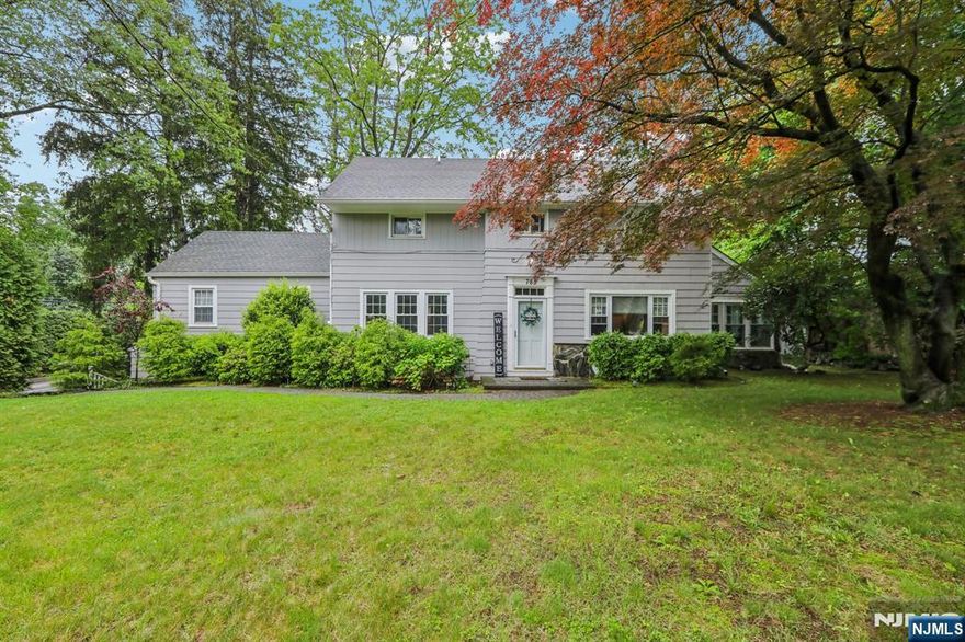 Welcome to this beautifully renovated mini estate offering old-world charm and modern upgrades throughout. Privately set on a professionally landscaped half-acre corner lot. This sun-filled home is surrounded by nature and cannot be seen from the roadâ€”truly a hidden gem. Features include: Spacious living room with fireplace and high ceilings, Stone-enclosed porch and bright office/sunroom, Elegant formal dining room, Newer kitchen with custom finishes, 4 bedrooms and 4.5 newer bathrooms, including two primary suites (one on the first level), Mudroom and fully finished basement with full bath and laundry room. Exterior highlights: Circular driveway with pillars and 3-car garage and plenty of parking. Underground sprinklers, walkways, front porch, and private patio, All newer electric and plumbing, newer 2-zone central air & heating, and newer water heater. This home blends timeless character with modern luxury in a very private settingâ€”ready to move right in! Call 201-615-5188 for private showings.