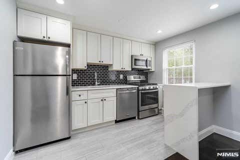 Photo of 84 Clark #84, Rutherford, NJ 07070 (MLS # 26030900)