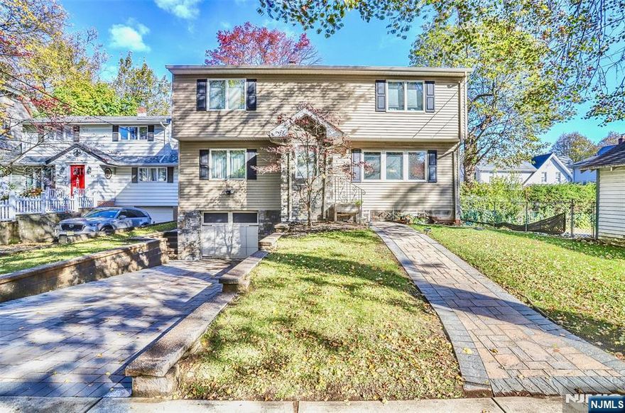 HIGHEST & BEST DUE 12/24 @ 8:00 PM. This beautifully updated 4-bedroom, 3-bath home is perfectly situated on the charming McDougall Lane in Bogota, offering the ideal blend of comfort, style, and modern convenience. The recently renovated gourmet kitchen features stone countertops, stainless steel appliances, and all-new fixtures (except the dryer). Enjoy year-round efficiency with a new high-efficiency HVAC system, smart thermostat, new hot water heater, and blown-in insulation for energy savings. Inside, new hardwood floors upstairs, solid-core bedroom doors for added soundproofing, and custom blinds throughout many of which remain add warmth and function. The finished basement provides flexible space for a family room, home office, or gym. Outside, a large backyard with a new storm door and a private front patio framed by mature arborvitae create the perfect setting for entertaining or relaxing. Additional updates include new springs on the garage door, a freshly maintained exterior, and an attached garage with a long driveway for ample parking. Conveniently located near parks, schools, and all that Bogota has to offer, this home combines thoughtful upgrades with timeless appeal.