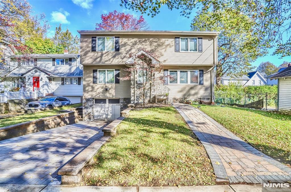 Photo of 65 McDougall Lane, Bogota, NJ 07603 (MLS # 25041587)