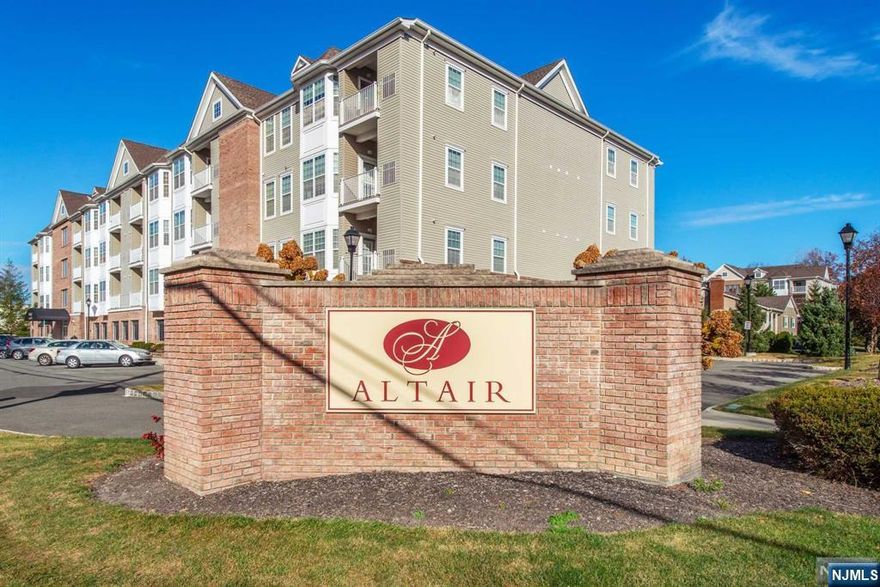 This bright and sunny condo in Building One of the Altair 55+ Community offers a spacious living room and dining area filled with natural light. The modern kitchen includes ample cabinet space, a pantry, and in-unit laundry for convenience. The large king-sized master bedroom features plenty of storage, a walk-in closet, and has sliding glass doors leading to a terrace. The updated bathroom boasts a new custom vanity. Throughout the unit, you'll find ample closet space, new flooring throughout, and tile floors in the kitchen and bathroom.Residents can enjoy the beautiful clubhouse, offering amenities such as a modern kitchen, party room, library, exercise room, and bathrooms with showers. The outdoor pool is perfect for summer fun, and the professionally landscaped walking path adds to the charm. Additional features include assigned parking under the building, a security intercom system, and two elevators for easy access. 1 pet up to 30 lbs is allowed in this smoke-free complex