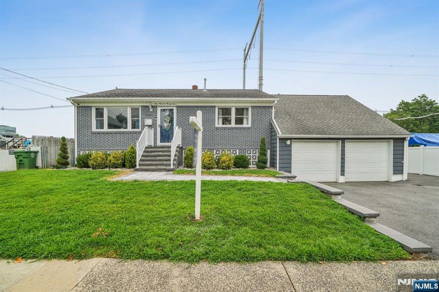 This beautifully renovated extended Ranch-style home is located in one of Roselle's most desirable neighborhoods and is truly move-in ready. Recent updates include a full interior and exterior paint job, new pavers, front retaining wall, and modern light fixtures that add style and warmth throughout the home. The main floor features gleaming hardwood floors and recently updated bathrooms. The fully finished basement offers versatile living space with ceramic tile flooring, a spacious great room, a full bathroom, plus separate laundry and utility areas, perfect for entertaining or extended living. Additional highlights include a two-car width attached garage and a prime location near the Garden State Parkway, providing easy access for commuters. Enjoy being close to local favorites like Johnny Tequila Bar, Ohmies Coffee Bar & Yoga Studio, and SuperFresh Grocery, along with parks, shops, and more. Don't miss the chance to own this stunning, turn-key home, come see it for yourself.