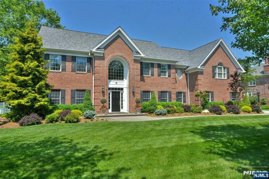 This one is a show stopper! Magnificent 5BR brick colonial with off-the-charts, exquisite backyard paradise, including saltwater pool w/infinity waterfall edge overlooking expansive, flat, field of a back yard, abutting acres of wooded town land, multi-level outdoor patio, outdoor kitchen, outdoor fireplace & pergola. Entertainment & private enjoyment paradise! This well-maintained home boasts many updates, custom finishings & beautiful built-ins. Kitchen renovation completed in 2015 including addition of Thermador 98 bottle wine refrig (2013), Subzero refrigerator & 2 Miele dishwashers. Gorgeous great room w/floor to ceiling windows, wood burning fpl & custom built-ins & coffered ceiling. Private office w/more built-ins, formal living room & dining room, 2 powder rooms & mudroom/laundry complete the first floor. Second floor has 5 true bedrooms including luxurious primary suite, dual walk-in closets, spa-like primary bath. Four additional bedrooms w/newer hardwood floors & built in custom closets, 2 full baths & balcony overlooking both the 2 story foyer & great room. Many updates to finished bsmt (2018). Lower level incl more built-ins, separate bar room w/pool table & wet bar, gym, sauna & full bath. New roof (2022), new HWH (2024), new front landscaping (2023), redone pergola (2021); A/C & pool equip replaced over last 7-10 yrs. Award winning schools. Too much to list. Truly a spectacular home and setting. Move right in and make this special paradise your own!
