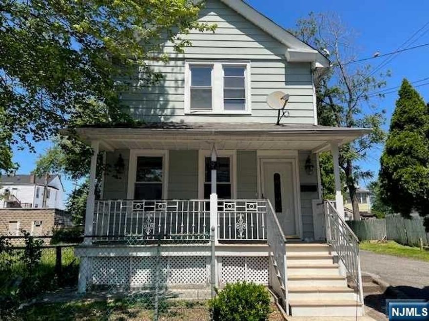 Open House today. Saturday June 3 1:00 - 3:00 Great opportunity to own a modest home on a dead end street in South Paterson. Neighborhood is quiet and near Clifton border close to major highways. Upside potential is evident as property is located in redevelopment zone, sitting on a double lot. This home features 2 full bedrooms, office space, living and family room, 2 bathrooms, and a bonus basement living space with rear entrance. Basement has a bathroom with shower. Home could use a little TLC or updating. Strictly sold as is. Buyer must complete due diligence and is responsible for C/O. ***Developers: Redevelopment zone potential subdivision subject to approvals, potential for building of two single or multi family dwellings. Due diligence strictly on buyer.