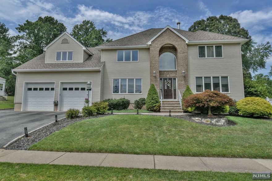 Welcome To This One-Of-A-Kind, Custom-Built Center Hall Colonial In The Highly Sought-After Valley Ponds Section Of Wayne. This picture-perfect home features a two-story foyer with access to both your over-sized formal dining room and impeccably appointed fam rm with a self-start wood fpl and custom coffered ceilings. The gourmet kitchen boasts an over-sized center island with granite counter tops as well as plenty of cabinetry. The second floor features the master suite complete with a luxurious mstr bth and walk-in his & hers closets, 2 brs with large closets, full BR, washer and dryer, and an approx. 800 square foot unfinished room that can be conveniently used as storage or converted into additional living space. The private backyard oasis has a heated saltwater pool surrounded by a paver patio, hot tub, outdoor half bath, over-sized storage shed, lighting, and a custom outdoor kitchen with 90 square feet of granite and an over-sized grill