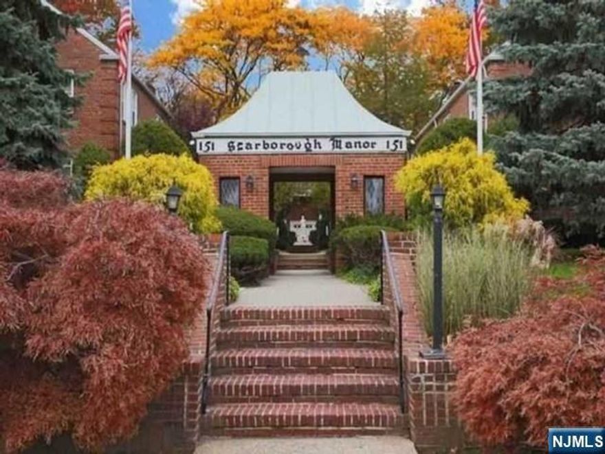 Desirable East Hill complex with bus stops at your doorstep. This bright 960 sq. ft. second-floor unit features a large renovated bedroom, a newer kitchen with stainless steel appliances, and refinished hardwood floors throughout. The dining room flows into the living room, and the bedroom offers great closet space plus incredible attic storage. Enjoy walking to downtown shopping, boutiques, theaters, and restaurants. Maintenance covers heat, hot/cold water, and lush landscaping.