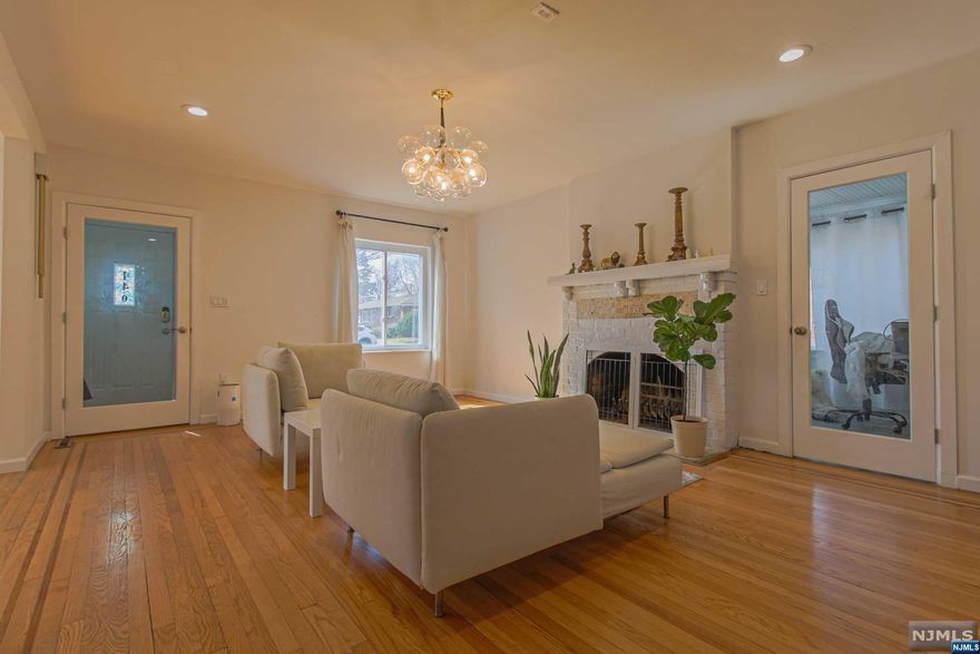 This stunning Tudor-style home boasts five bedrooms and one and a half bathrooms in the highly sought-after area. With its brick and stucco exterior, steeply pitched rooflines, and charming arched windows, this home exudes character and charm. The interior of the home is equally impressive, having been meticulously maintained and thoughtfully updated. One will love the spacious living areas with beautiful hardwood floors, perfect for entertaining guests or enjoying a cozy night in. The upgraded kitchen features modern appliances, granite countertops, and ample storage space. You will also appreciate the abundance of natural light that floods the home, creating a warm and inviting atmosphere. In addition, this property also boasts a brand new water heater and a backyard that is perfect for outdoor activities. The two car garage is a plus. Close to the downtown area and easy access to NYC. Close to public transportation. Don't miss out on this! Schedule an appointment now!