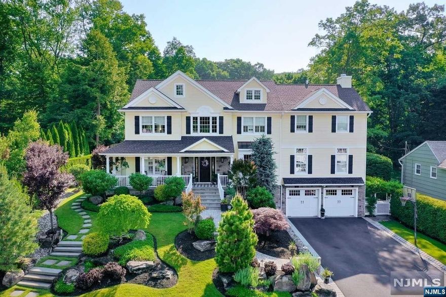 Stunning colonial in prime cul-de-sac location in the Cragmere section.Built in 2014, this custom home offers just under 4000sf. Upon arrival, you will be welcomed by the wrap around lemonade porch that leads you into the grand 2-story foyer. The open floor plan consists of a lr,dr & great room w/coffered ceilings & a gas fpl.The kitchen is a cook's dream w/high-end appliances & a walk-in pantry w/2nd fridge. The powder room & laundry room complete the first floor.Upstairs find 3 nicely appointed bedrooms & 2 full baths.The primary suite has a fpl, tray ceiling, built-n bench & 2 closets. The spa-like bath has 2 sinks, tub & walk-in shower.The lower level is finished w/family room, exercise rm,powder room & mudroom with built-ins which leads to the heated 2 car garage.Feel like you are on vacation with the resort-like backyard oasis complete w/in-ground saltwater pool& outdoor kitchen w/bar.Too many amenities to list...see you tube link:https://youtu.be/xwTp22t-Npk