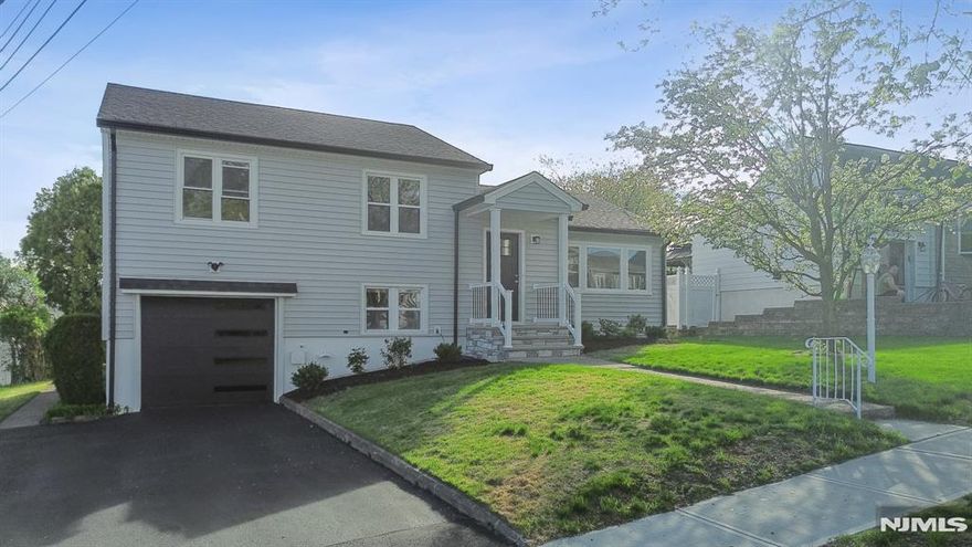 Welcome to 27 Mountainview Drive a beautifully updated and spacious split-level home in the highly desirable Albion section of Clifton. This move-in-ready home offers the perfect balance of modern updates, flexible living space, and sweeping NYC skyline views. Head into a bright and inviting open-concept layout with a seamless flow between the living room, dining area, and fully renovated kitchen-ideal for everyday living and easy entertaining. The kitchen features new modern cabinetry, clean finishes, and brand-new appliances, creating a stylish and highly functional space. The living room is enhanced by a new large picture window, filling the space with natural light. The home includes four generously sized bedrooms and two full bathrooms, including a private full bath on the lower level adjacent to the fourth bedroom, making it ideal for a guest suite or private home office space. A fully finished basement offers a spacious, oversized bonus area, perfect for a family room, recreation space, home gym, or additional work-from-home setup. Outside, a spacious yard with patio offers room to relax or entertain, while new stylish exterior finishes and updated entry details create a stunning, modern look. Thoughtfully updated throughout, this home offers true turnkey living with a fresh new modern feel. Conveniently located near NYC transportation, major highways, shopping, dining, and parks, it combines accessibility with the comfort of a well-established neighborhood.