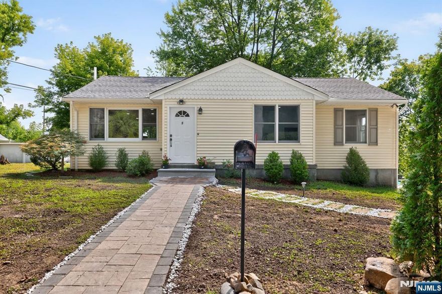 Welcome to 1 Gorge Dr, a beautifully renovated raised ranch located in the highly desirable Rainbow Lake section of Haskell (Wanaque). Completely updated, this warm, inviting home offers 4 generous bedrooms & 2 full baths. The main level features an open concept living & dining area, a newly upgraded gourmet kitchen w/ stainless steel appliances, custom cabinetry, quartz countertops & a center island, plus 3 spacious bedrooms & a full bath. Gleaming hardwood floors throughout. Sliders from the dining room lead to a beautifully re-done deck & above-ground pool, an ideal outdoor oasis with a big, private yard perfect for summer barbeques & family gatherings. The lower level provides an additional large bedroom, home office, a spacious family room for entertainment w/ sliders to the landscaped backyard, & a combined laundry room & kitchenette w/ cooktop, & brand new washer/dryer perfect for guests or an in-law suite. Also on this level are a full bath & utility room. Additional highlights include central air, upgraded electric & high-speed ethernet, a brand-new roof, abundant storage, & a large driveway that fits 5 cars. Low taxes! A block away from Rainbow Lake where residents enjoy swimming, fishing & boating in a private community-only setting. This home has an exceptional blend of vintage charm with lakeside lifestyle & commuter convenience. Close to shops, restaurants & major highways/transportation. A rare find in the Rainbow Lake area! Schedule your showing today!