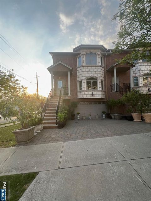 Photo of 309 E 8th ST, Palisades Park, NJ 07650 (MLS # 26014971)