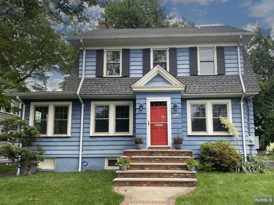 You must see this bright and updated home in one of the most desirable and quiet neighborhoods in Maplewood! Just minutes to walk to downtown and city train. Easy access to restaurants, schools, shopping, and highways. All hardwood floors newly stained and refinished, new designer lighting and hard-wired smoke alarms installed, complete interior paint job throughout, updated bathroom fixtures. Enjoy 4 levels of living - the first floor has a formal dining room with stunning coved ceiling and moldings, the living room has a wood burning fireplace and built-in bookcases, and the four season sun room is a sunny place with more built-ins for play, office, and more. A large eat-in kitchen has access to huge deck in a luscious, level yard. There is a convenient first-floor powder room. The second level boasts the primary bedroom, main bath, and 2 more bedrooms. Going up to the newly carpeted third floor is another bedroom, study, and full bath. Enjoy the lower level family room.