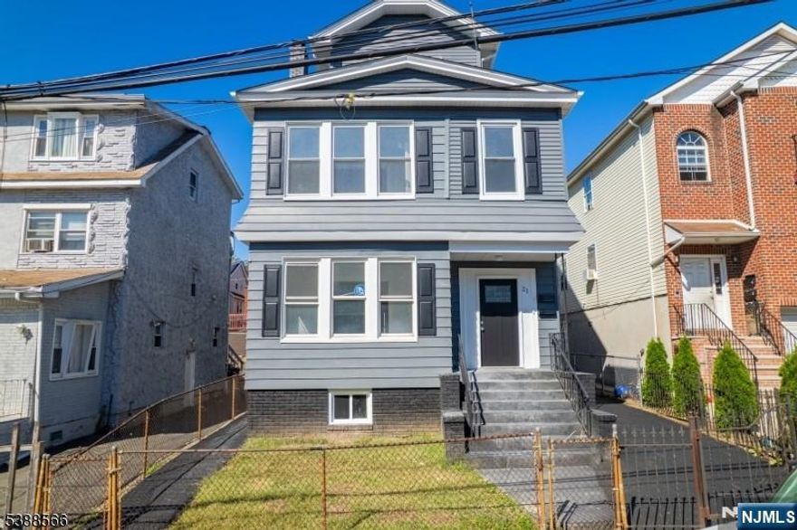 Newly renovated 2 family home with a bonus apartment on the 3rd floor, on a quiet neighborly street. Beautiful Kitchens and baths on both floors. The 3rd floor has a living room, dining room, bedroom and a potential kitchen. There is a Laundry attachment in the basement, and a newly paved driveway. Very close to all major highways and Penn Station. A MUST SEE!!!! won't last long!!!!