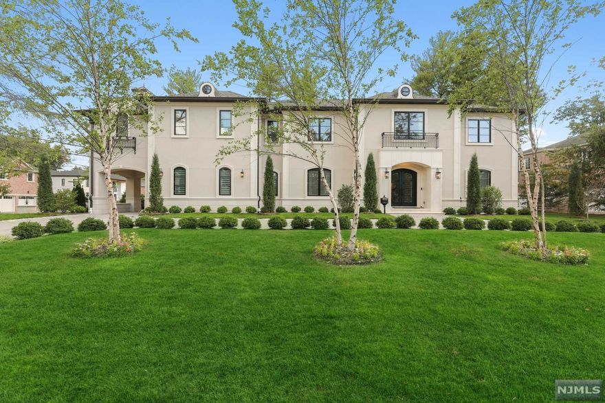 A TRULY SPECTACULAR CUSTOM-BUILT ESTATE, MAJESTICALLY SET BACK ON A CORNER PROPERTY WITH INCREDIBLE GROUNDS IN ONE OF THE MOST SOUGHT-AFTER AREAS OF THE NORTH CLIFFS! DRIVE THRU A LARGE CIRCULAR DRIVEWAY TO A STUCCO & PRECAST PORTICO. GREETED BY A GRAND 2 STORY ENTRY FOYER FORMAL LIVING, DINING & GREAT RMS WITH A FIREPL, OFFICE, CHEF'S KITCHEN W/ HIGH END APPLIANCES & ISLAND, BRIGHT BRKFT RM, BEDRM, FULL BATH, PR, MUD RM & PUPPY SHOWER. 2ND FL: LIV RM, MST BEDRM & LG SPA LIKE BATHRM W/SOAKING TUB, LG SHOWER, HIS & HER WALK-IN CLOSETS & LARGE SITTING RM. WET BAR, 4 ADDT'L BR'S 3 BATH RMS, LAUNDRY RM. LL: CUST WINE CELLAR & BAR, FAMILY RM, 7 SEAT THEATER, SAUNA RM, GYM, BED & BATHRM, HARDWOOD, CUSTOM MOLDING, BUILT-INS, RADIANT HEAT, SURROUND SOUND THROUGHOUT, GENERATOR, PATIO W/BBQ & SITTING AREA, 3 CAR GARAGE, SO MANY MORE AMENITIES TO LIST! ROOM FOR A POOL, TAXES, CLOSE TO THE BEST PRIVATE SCHOOLS & GOLF COURSES TO NYC. LUXURY AT IT'S FINEST HURRY HOME TO YOUR DREAM ESTATE!