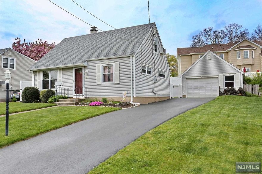 Welcome to this warm and inviting 4 bedroom, 1 bath Cape Cod home in the sought after town of Waldwick. The first floor features living room with dining area, kitchen with abundant cabinets and door to yard, main bedroom, 2nd bedroom and updated full bath. The second floor offers two additional bedrooms with great closet space and laundry. You will absolutely LOVE the beautiful fenced yard with patio, fire pit and waterfall - ideal for relaxing and entertaining! There is fabulous bonus space in the oversized garage with walk-up second floor! Many things to love about this home including newer driveway and roof. Ideal location near park, town and transportation. A great opportunity to live in Waldwick - come see it today!