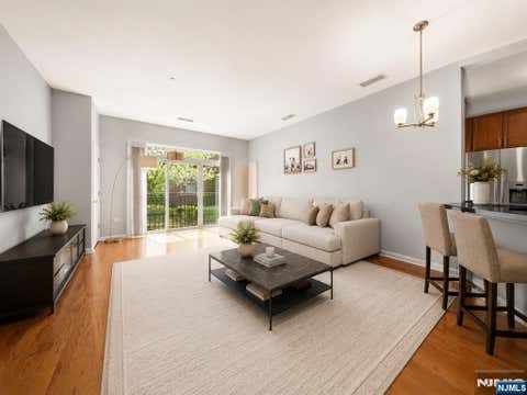 Photo of 1120 Riverview Avenue #120, Englewood, NJ 07631 (MLS # 26024466)