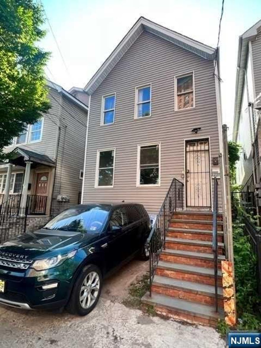 Explore this fantastic opportunity to invest or owner occupy a two-family property with excellent income potential. First unit is currently vacant and offers a spacious layout with a living room, kitchen, three bedrooms, and two baths adorned with beautiful hardwood flooring. The second unit is occupied, offering a living room, kitchen, four bedrooms, and two baths. The property includes an unfinished basement ideal for storage. Property was renovated within the last four years. Conveniently located near parks, restaurants, shopping centers, public transportation, major highways, and easy NYC commute. To preview this property, please call Ascensao Gutierrez at 973-207-0956