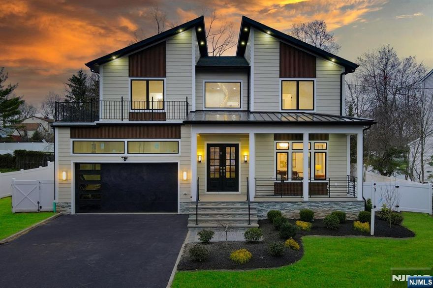 New construction colonial home w/ 6 Bd, 5.5 Ba. On a .38-acre lot w/ 4,500 Sft of living space across 3 levels. Main level features an open living & dining area. The kitchen comes w/ SS appliances including 48' Sub Zero fridge, 48'Wolf cooktop w/ wall oven, quartz countertops, custom cabinetry, a walk-in pantry,& a wet bar. The family room has a gas fireplace & glass sliders opening to a deck overlooking the backyard. This level also includes a guest bdrm w/ a full bath, a mudroom & powder room.Upstairs, the Primary Suite offers a massive custom walk-in closet & a spa-like bathroom w/ a soaking tub, shower,& dual sinks. Also has access to a wraparound balcony. Here you will also find, 3 spacious bdrms, 1 w/ own ensuite bathroom & a shared bathroom for the other 2. Laundry rm completes this level. The fin. basement adds versatile living space, w/ a big recreation room, additional bdrm, and a full bathroom. Conveniently located close to Shopping, Recreation and NYC Bus.