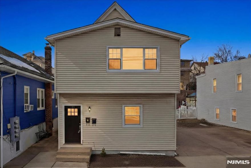 Fully renovated two-family home in Garfield offering modern upgrades and excellent space both inside and out. This turnkey property features brand-new insulation, updated electrical and plumbing systems, and beautifully renovated interiors. Each unit offers a new kitchen with modern cabinetry, updated appliances, stylish flooring throughout, and two bedrooms on each floor. The second-floor unit also includes a den/office space, perfect for working from home or additional living space. The attic is currently unfinished but offers great potential to be easily integrated into the home for additional living space. The unfinished basement provides two separate areas with laundry hookups and convenient access from the backyard. The property features a spacious yard ideal for outdoor enjoyment and entertaining. A nice size driveway provides ample off-street parking. Perfect for investors or owner-occupants seeking a move-in-ready property with strong income potential.