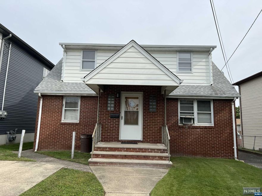 Located in a two family zone. Truly a rare opportunity. Large lot. Second floor has a dormer and can easily be finished with two large bedrooms and a full bath. First floor has a living room, two bedrooms, full bath, eat-in kitchen. Must be seen to appreciate. Can easily be converted to a 2family. Large basement. Gas heat.