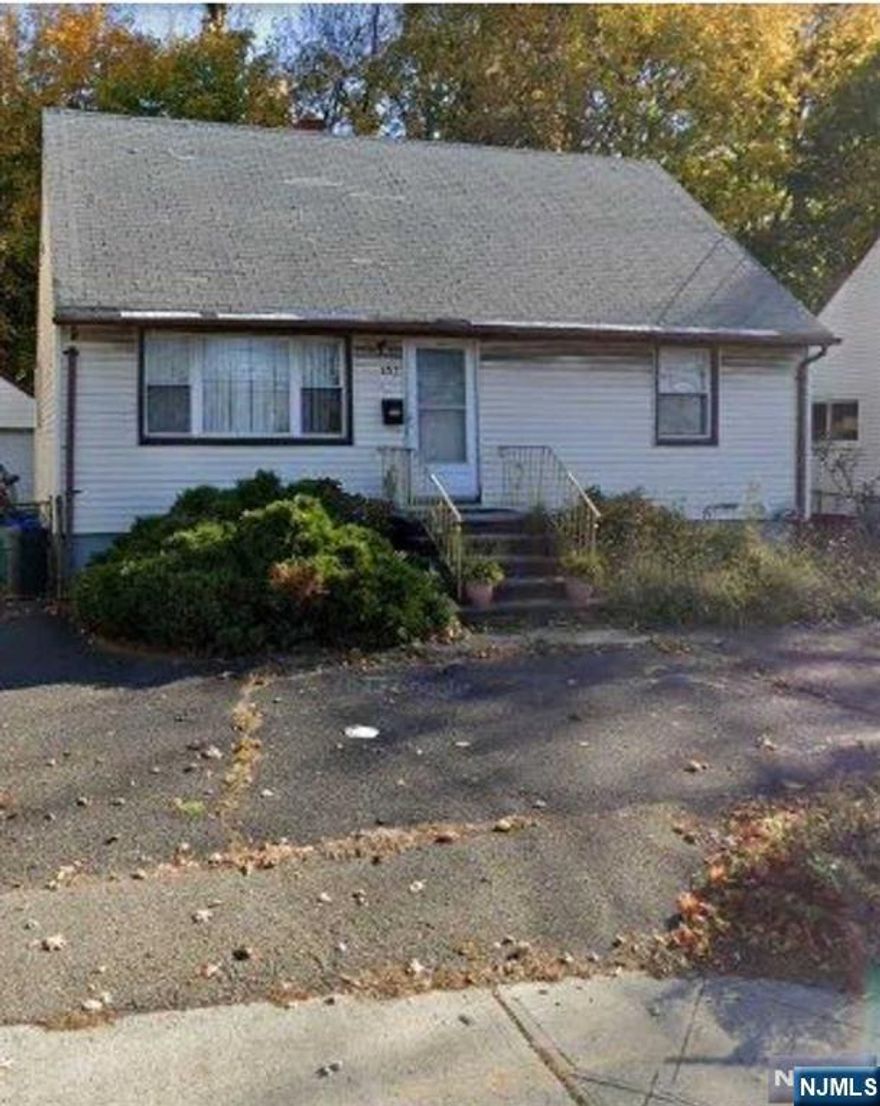 Investor Alert: Prime Opportunity at 402 Broad Ave, Ridgefield, NJ! This spacious lot, just over 50x100, is perfectly situated in a 2-family zone, making it a fantastic investment for builders and investors alike. Zoning: Conforming 2-family zone Potential Build: Up to 3200 SF, allowing for a 6-bedroom, 4-bath 2-family setup (3bd/2ba units) Existing Structure: Single-family home, 1400 SF, 4bd/2ba (second full bath in the basement) Condition: Fully gutted down to the studs plumbing and electrical completely out of date, ready for a full renovation (no asbestos or galvanized pipes) Driveway: Ample space for at least 4 cars, plus a detached 1-car garage Basement: Clean and dry with 2 sump pits; one currently has a functioning sump pump This property is a blank canvas ready for your vision. Whether you choose to renovate the existing structure or build new, the potential is significant. Don't miss out on this rare opportunity to capitalize on the thriving Ridgefield market!